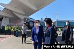 A shipment of Chinese Sinopharm vaccines to Belgrade is met by Serbian Prime Minister Ana Brnabic and Chen Bo, China’s ambassador to Belgrade, on April 5.