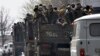 Nagorno-Kararbakh -- Volunteers of the defense army of Nagorno-Karabakh ride on trucks in Stepanakert, April 7, 2016