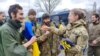 Украинские военные после освобождения