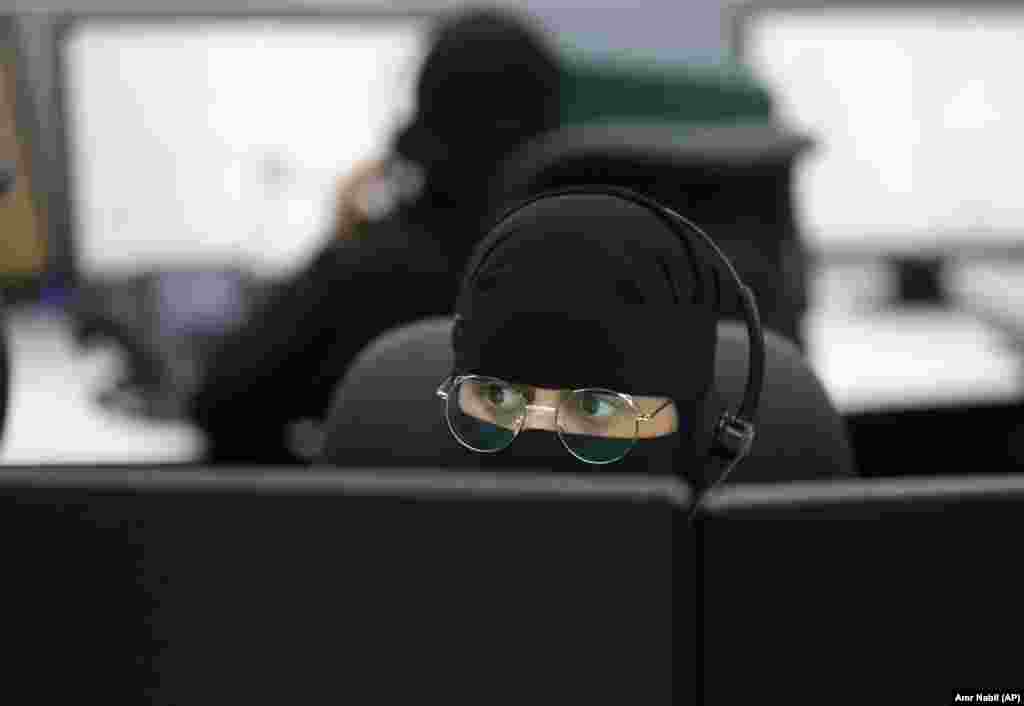 A Saudi police officer receives emergency calls at a call center ahead of the Hajj pilgrimage in the Muslim holy city of Mecca. (AP/Amr Nabil)&nbsp;