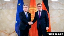 Жээнбек Кулубаев жана Йоханн Вадефул.