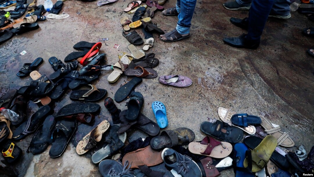 A view of footwear left behind after the deadly stampede in Karachi on March 31.