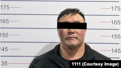 Кылмышка шектүү деп кармалган жаран (милиция тараткан сүрөт)