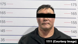 Кылмышка шектүү деп кармалган жаран (милиция тараткан сүрөт)