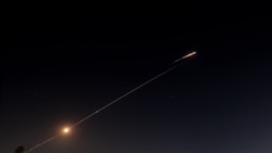 Як мушаки партобшуда аз Эрон дар фазои Исроил. 11-уми марти 2026