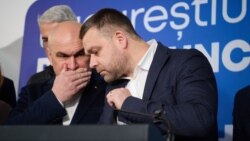 Premierul Ilie Bolojan și viitorul primar al Bucureștiului, Ciprian Ciucu, într-o fotografie de după anunțarea rezultatelor.