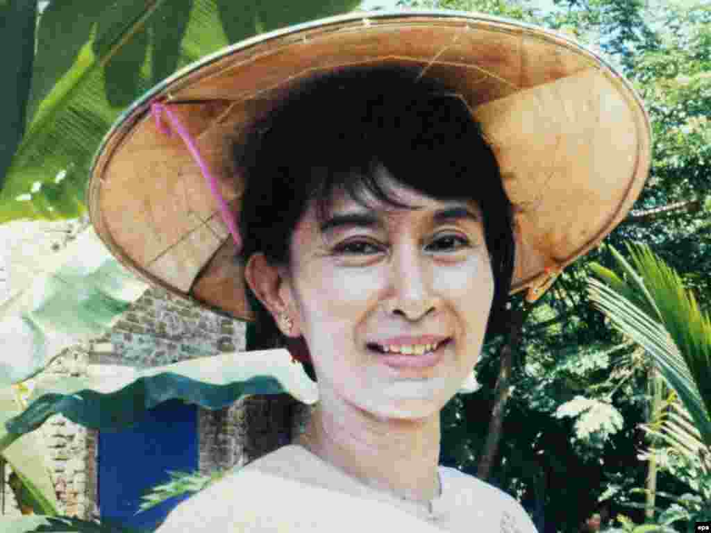 A 2002 photograph of Suu Kyi in her garden in Mandalay, Myanmar.