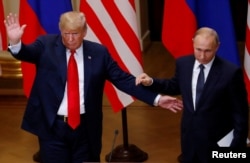 Donald Trump și Vladimir Putin, la Helsinki, în iulie 2018