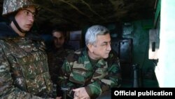 Armenia - President Serzh Sarkisian inspects an Armenian army post on the border with Azerbaijan, 31Dec2013.