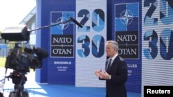 Jens Stoltenberg NATO-főtitkár Brüsszelben nyilatkozik a sajtónak 2021. június 14-én