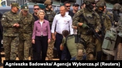 European Commission President Ursula von der Leyen and Polish Prime Minister Donald Tusk visit Poland's border with Belarus on August 31.
