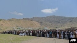 Afghan mourners offer funeral prayers for a victim killed in a Taliban truck-bomb attack in April. New figures indicating that rates of civilian casualties in the restive country may be leveling off at near-record levels after steadily increasing over the previous years.