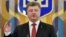 Ukrainian President Petro Poroshenko has called the signing of the Association Agreement a "historic moment" for his country.