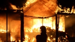 A Ukrainian rescuer works at the site of a Russian strike in Kyiv on August 16, 2026, amid the Russian invasion of Ukraine.