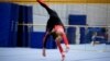 Njemačka gimnastičarka Sarah Voss na treningu u Kelnu nosi triko koji pokriva cijelo tijelo, maj 2021.