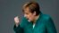 German Chancellor Angela Merkel delivers a speech during a debate at the German parliament in Berlin on June 28.