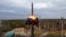 A Yars intercontinental ballistic missile is test-fired as part of Russia's nuclear drills from a launch site in Plesetsk, northwestern Russia, in October 2022.