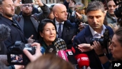  Georgian President Salome Zurabishvili speaks to the media after voting in Tbilisi on October 26.