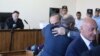 Armenia -- Former Armenian President Robert Kocharian hugs Karabakh President Bako Sahakian during his trial in Yerevan, May 16, 2019.