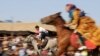 Nomads race on horseback during a cultural festival in Semirom, southern Iran.
<br /><br />Photo by Mehr
