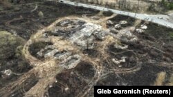 Акопы, выкапаныя расейскімі вайскоўцамі на тэрыторыі Рудога лесу каля Чарнобыльскай АЭС падчас акупацыі гэтай тэрыторыі