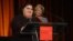 RFE/RL's Azerbaijani Service correspondent Khadija Ismayilova accepts the 2012 "Courage in Journalism" award from the International Women's Media Foundation in New York in October 2012.