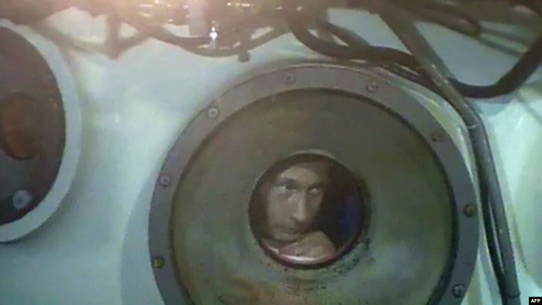 Putin braves the icy waters of Lake Baikal in a mini-submersible named Mir-1.