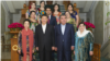 Tajik President Emomali Rahmon (2nd right) and members of his family pose at a banquet for Chinese leader Xi Jinpeng (2nd left) and his wife in Dushanbe in 2014.