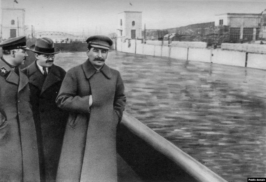After Yezhov himself was executed, the photos of Stalin and his honchos strolling along a Moscow canal was neatly updated to remove &ldquo;the poison dwarf.&rdquo;