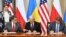 U.S. Energy Secretary Rick Perry (left to right), Polish energy official Piotr Naimski, and Ukrainian National Security and Defense Council chief Oleksandr Danylyuk sign an accord in Warsaw on August 31.