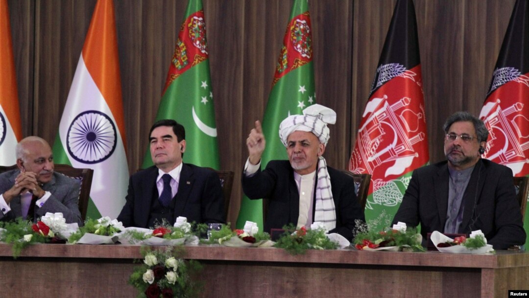 Afghan President Ashraf Ghani (2nd right) speaks during the inauguration of TAPI pipeline construction work, while Pakistani Prime Minister Shahid Khaqan Abbasi (right), Turkmen President Gurbanguly Berdymukhammedov (2nd left), and Indian Minister of State for External Affairs M.J. Akbar (left) listen in Herat on February 23.