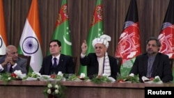 Afghan President Ashraf Ghani (2nd right) speaks during the inauguration of TAPI pipeline construction work, while Pakistani Prime Minister Shahid Khaqan Abbasi (right), Turkmen President Gurbanguly Berdymukhammedov (2nd left), and Indian Minister of State for External Affairs M.J. Akbar (left) listen in Herat on February 23.