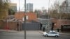 Security staff and a Russian police car outside the U.S. Embassy in Moscow on April 20. 
