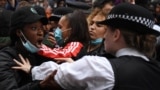 U.K. -- Protestors remonstrate with Police officers near the Foreign Office, during an anti-racism demonstration in London, on June 3, 2020, after George Floyd, an unarmed black man died after a police officer knelt on his neck during an arrest in Minneap