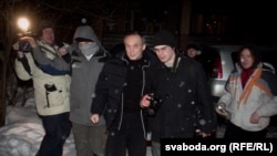 The release from prison of Uladzimer Nyaklyaeu (center left) on January 29