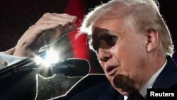 US President Donald Trump gives remarks at dinner for Republican Congress members on March 25.