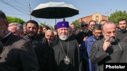 Armenia - Catholicos Garegin II walks back to his Echmiadzin headquarters after a court hearing in Vagharshapat, August 7, 2026.