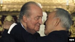 Kazakh President Nursultan Nazarbaev (right) seems to be surrounded by devotion. Here is pictured with Spain's King Juan Carlos in Madrid in February.