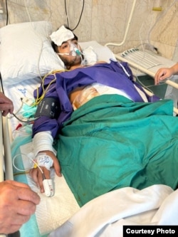 میلاد حسن‌زاده بعد از اصابت دو گلوله در بیمارستان