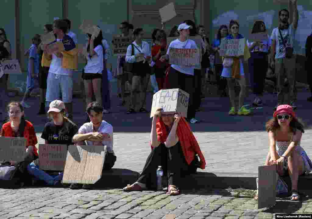 Young protestors in the coastal city of Odesa with placards that include a message saying: "The army needs reforms."