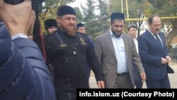 Chechen leader Ramzan Kadyrov (left) visited the tomb of Islamic cleric Muhammad Sodiq Muhammad Yusuf, who taught Kadyrov’s late father, former Chechnya head Akhmat Kadyrov.