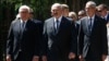 Belarusian President Alyaksandr Lukashenka (center) flanked by German President Frank Steinmeier (left) and Austrian President Alexander Van der Bellen (right) attend an unveiling ceremony for a monument to the victims of World War II on the grounds of the former Nazi concentration camp in Trostenets on June 29. 