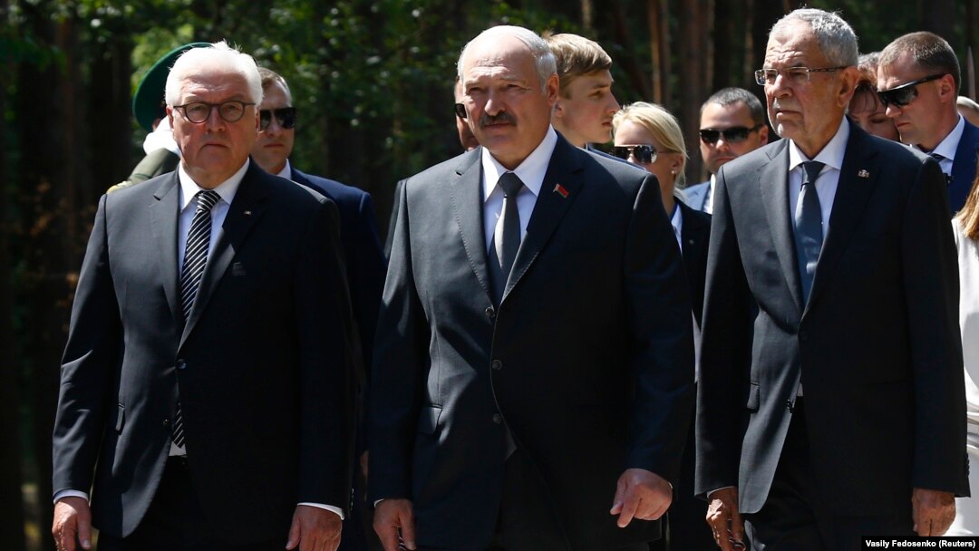 Belarusian President Alyaksandr Lukashenka (center) flanked by German President Frank Steinmeier (left) and Austrian President Alexander Van der Bellen (right) attend an unveiling ceremony for a monument to the victims of World War II on the grounds of the former Nazi concentration camp in Trostenets on June 29. 