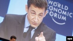 French President Nicolas Sarkozy speaks during the opening session of the 40th meeting of the World Economic Forum in Davos today.