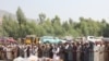 د کونړ په نورګل ولسوالۍ کې د وژل شویو د جنازې مراسم. سرچینه: فرانس پریس