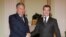 A year ago, Russian President Dmitry Medvedev (right) and Kyrgyz President Kurmanbek Bakiev were all smiles.