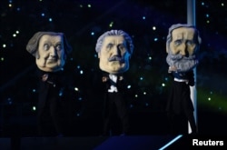 Джузеппе Верди, Джакомо Пуччини және Джоакино Россини бейнесі. Қысқы олимпиаданың ашылу салтанаты. Милан, Италия, 6 ақпан, 2026 жыл.