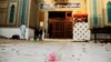 A baby's milk bottle lays at the entrance to the shrine of Sufi Muslim Saint Lal Shahbaz Qalander after a suicide bomb attack in Sehwan on February 17.