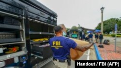 FBI Evidence Response Team on site after the shooting incident at a naval base in Pensacola, Florida.