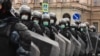 "Just plain, old-fashioned authoritarianism”? Russian riot police block a street during a rally in support of jailed Kremlin critic Aleksei Navalny in central St. Petersburg on April 21.